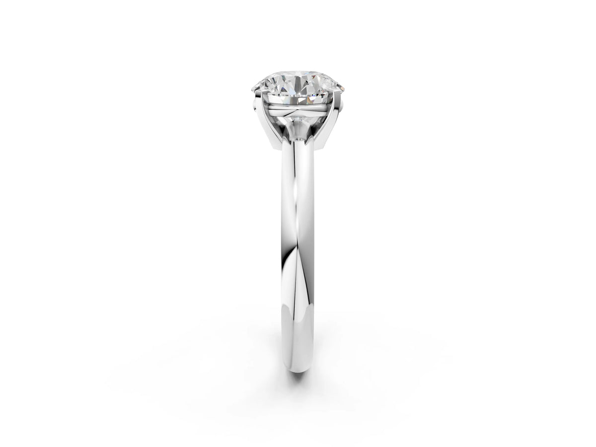 Round Cut Diamond Solitaire Ring in Silver with Prong Setting and Rounded Band