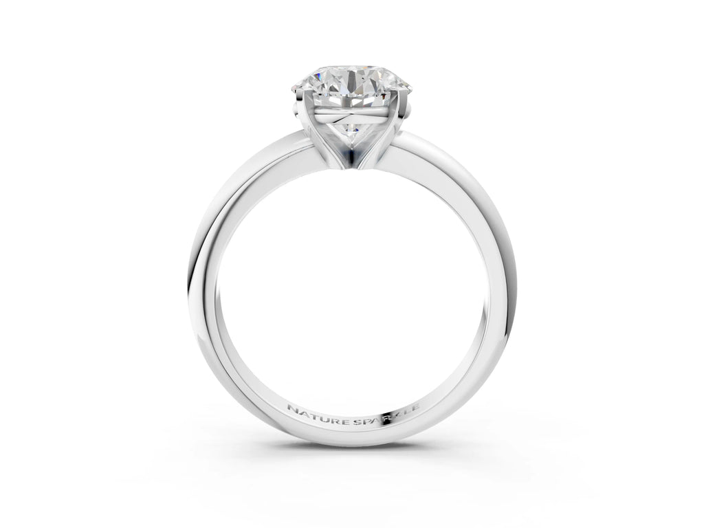 Round Cut Diamond Solitaire Ring in Silver with Prong Setting and Rounded Band
