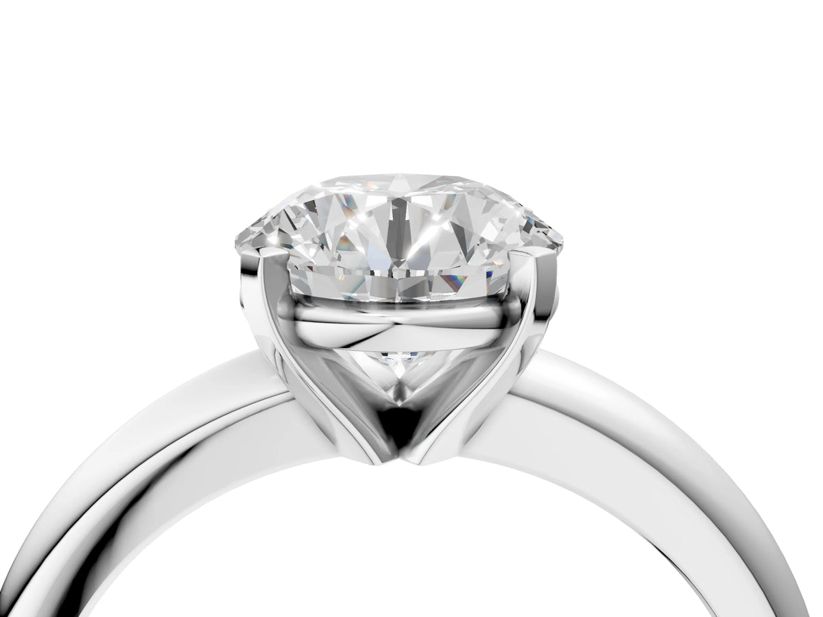 Round Cut Diamond Solitaire Ring in White gold with Prong Setting and Rounded Band