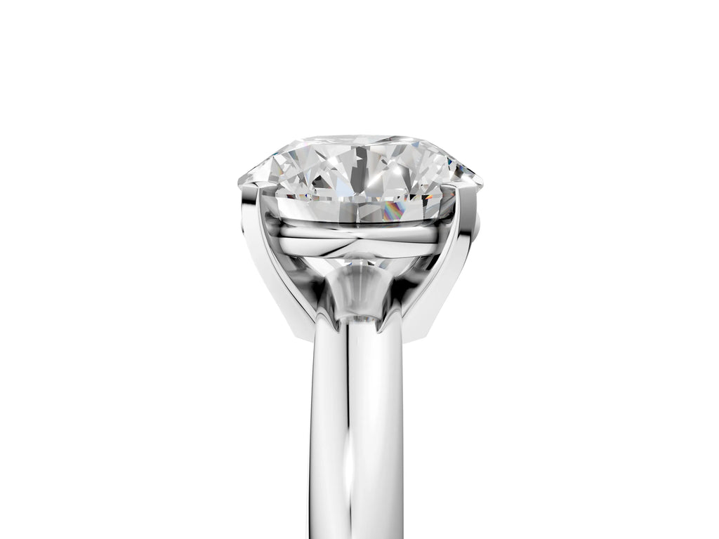 Round Cut Diamond Solitaire Ring in Silver with Prong Setting and Rounded Band