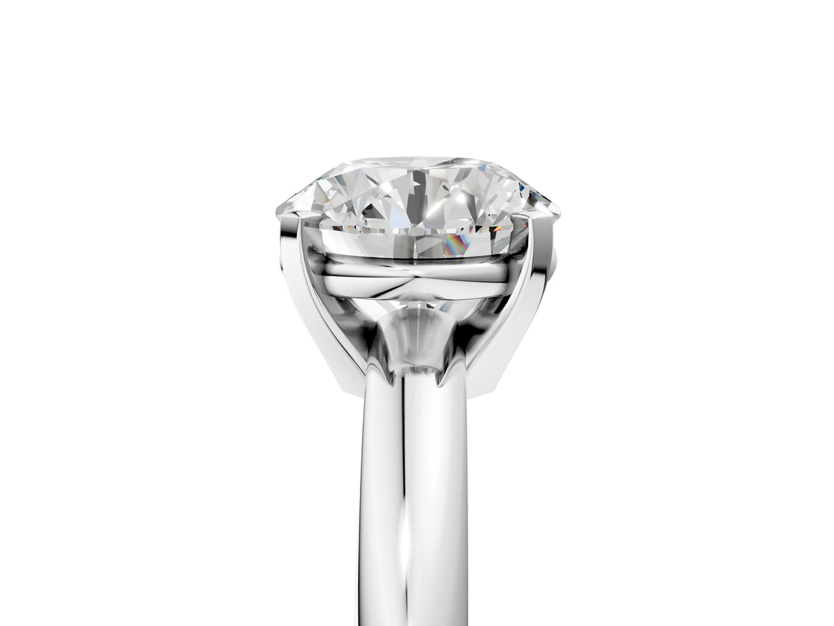 Round Cut Diamond Solitaire Ring in Silver with Prong Setting and Rounded Band