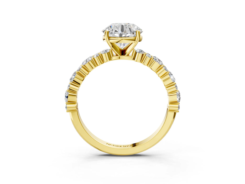 Round Cut Diamond Solitaire Ring in Yellow gold with Pear and Round Cluster Band