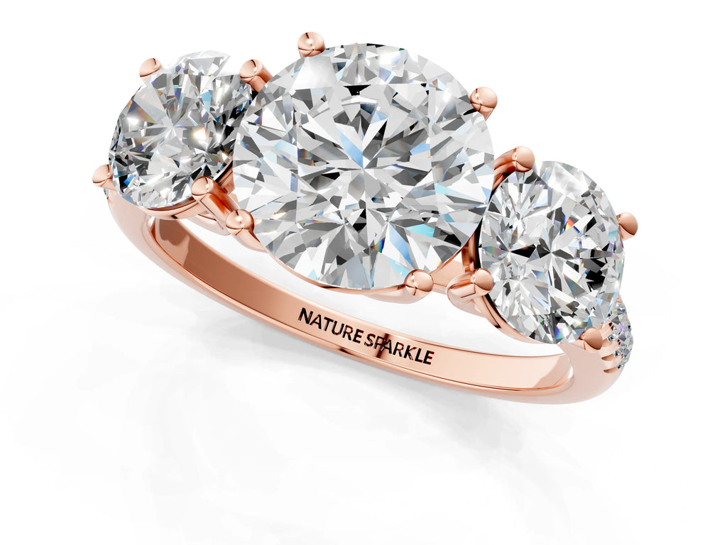 Round Cut Diamond Trellis Three-Stone Engagement Ring in Rose gold with Round Side Stones