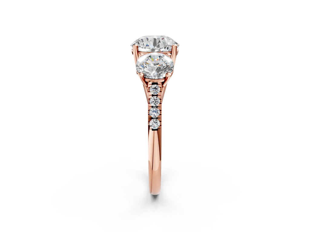 Round Cut Diamond Trellis Three-Stone Engagement Ring in Rose gold with Round Side Stones