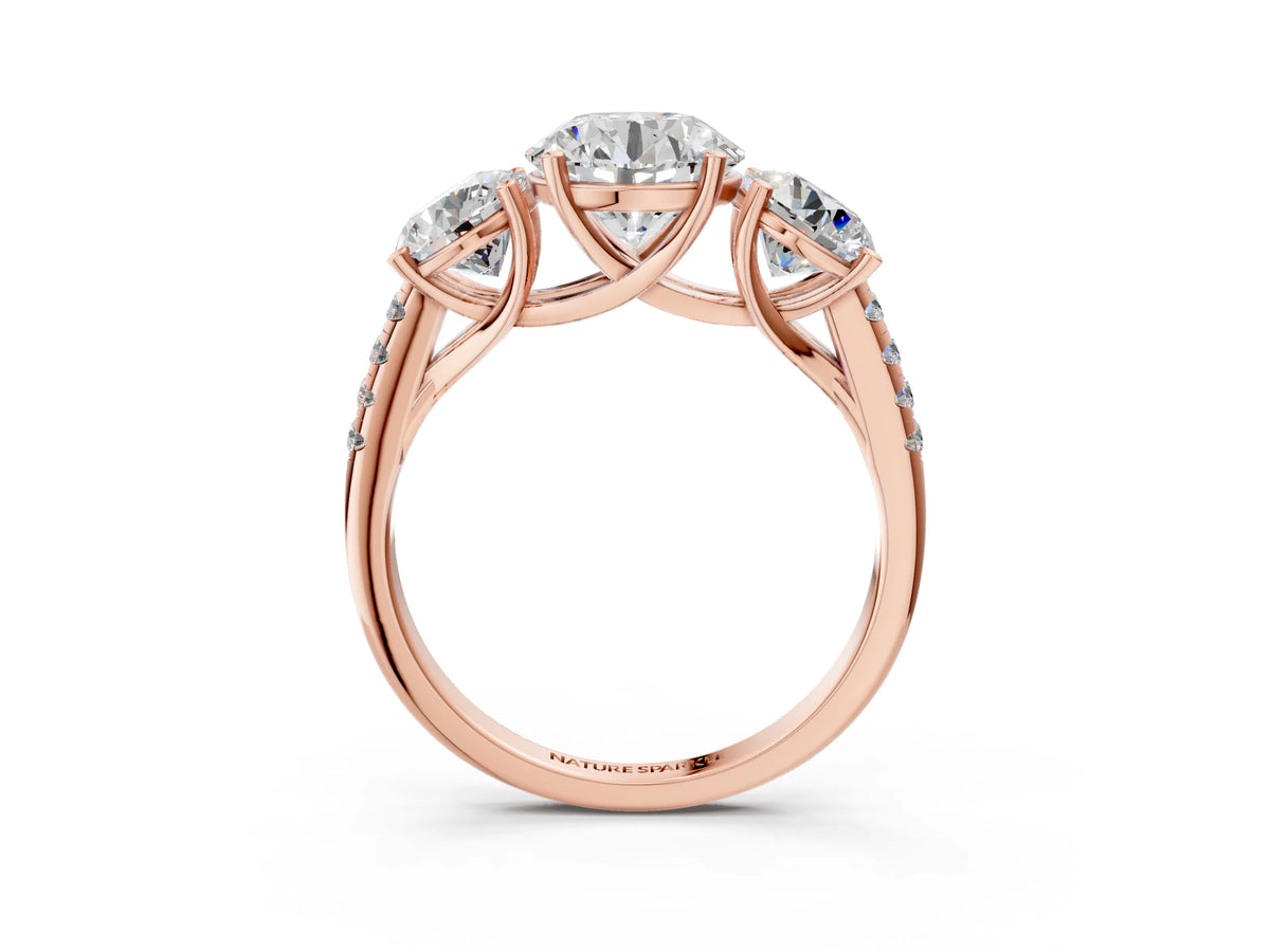 Round Cut Diamond Trellis Three-Stone Engagement Ring in Rose gold with Round Side Stones