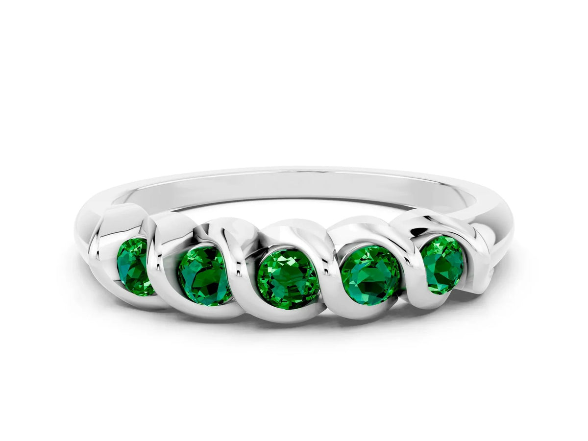 Round Emerald Eternity Band in Platinum with Twist Prong Setting 