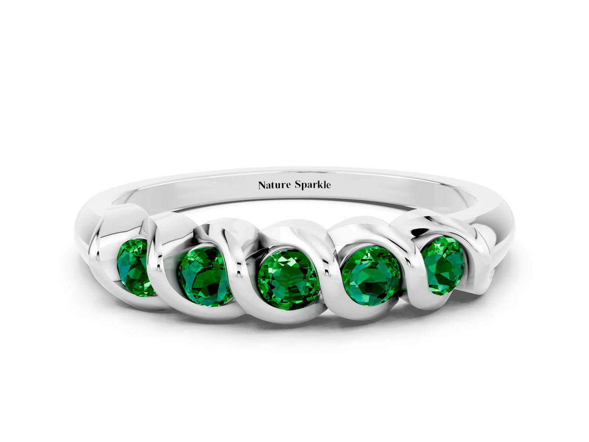 Round Emerald Eternity Band in Platinum with Twist Prong Setting