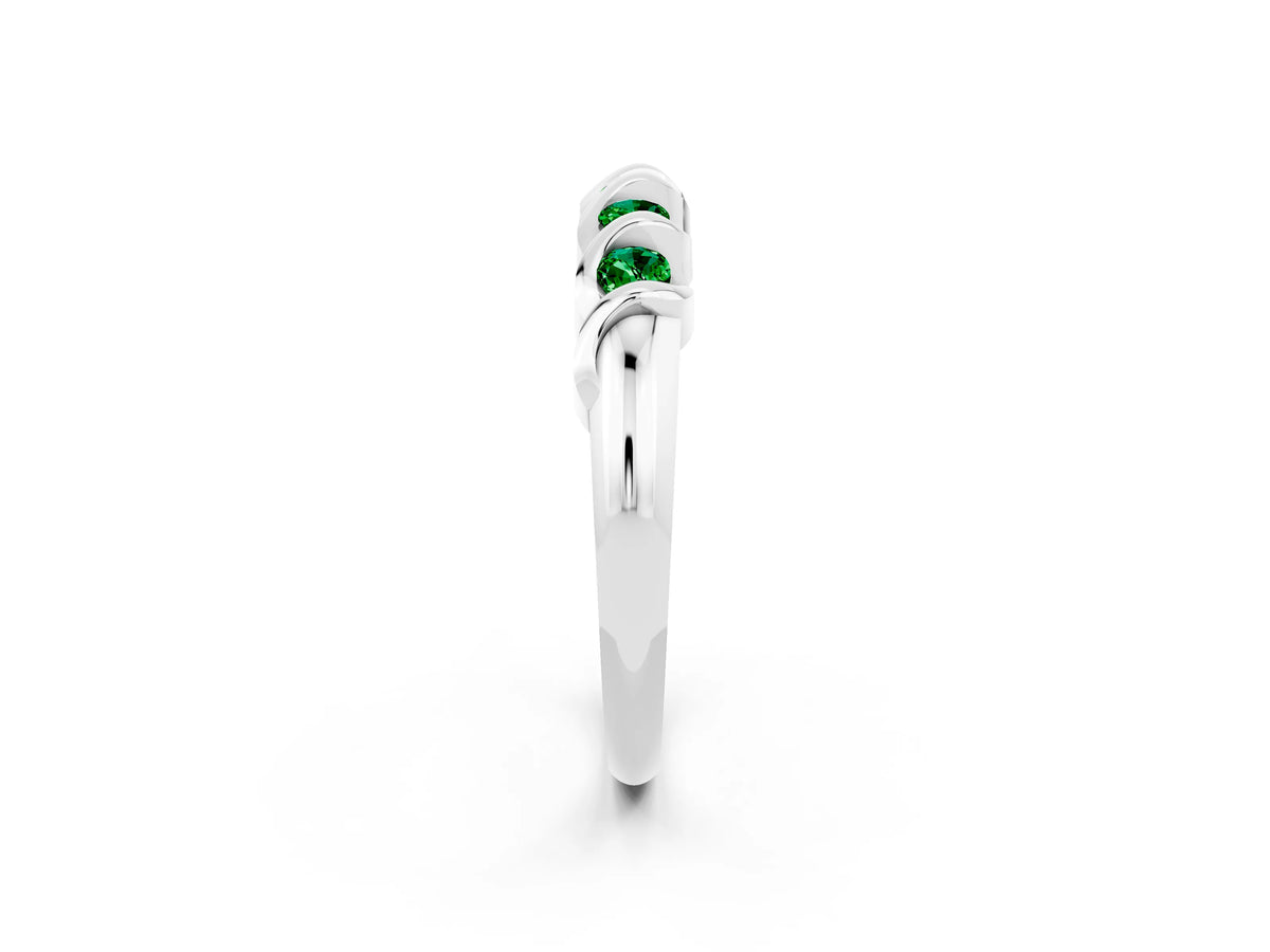 Round Emerald Eternity Band in Platinum with Twist Prong Setting