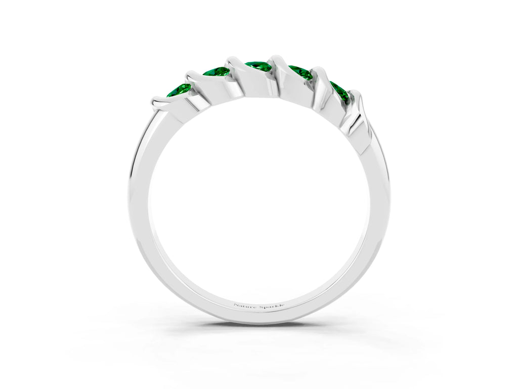 Round Emerald Eternity Band in Platinum with Twist Prong Setting