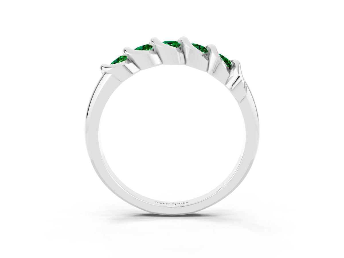 Round Emerald Eternity Band in Platinum with Twist Prong Setting