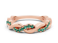Round Green Sapphire Pavé Twist Eternity Band in Rose gold with Shared Prong Setting