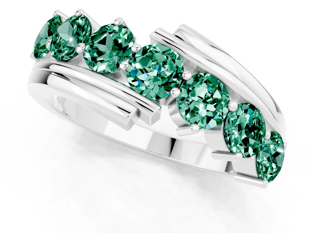 Round Green Sapphire Wave Band in Silver with Channel and Shared Prong Setting