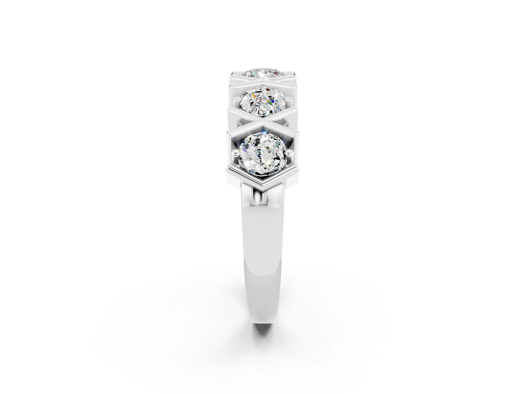 Round Moissanite Channel Set Band in Platinum with X-Prong Detail