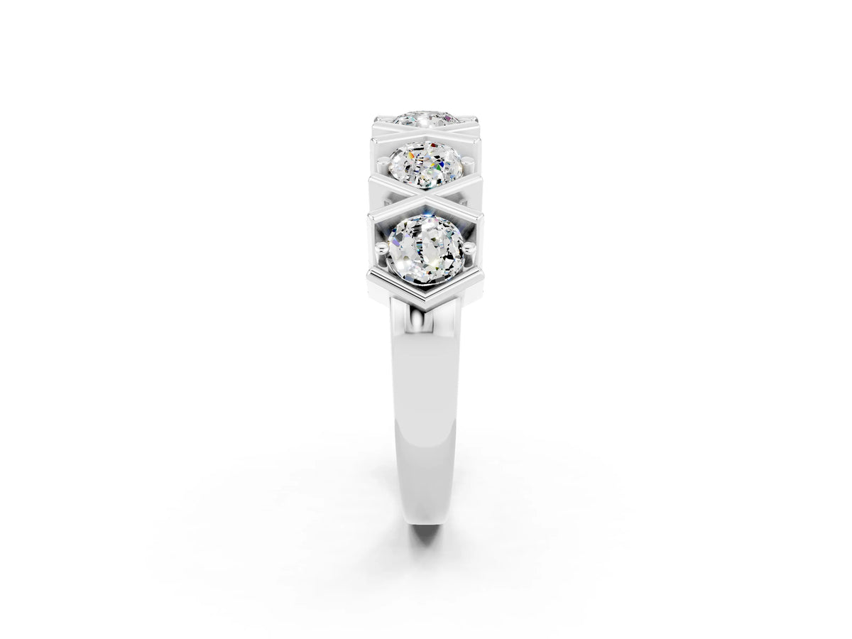 Round Moissanite Channel Set Band in Platinum with X-Prong Detail