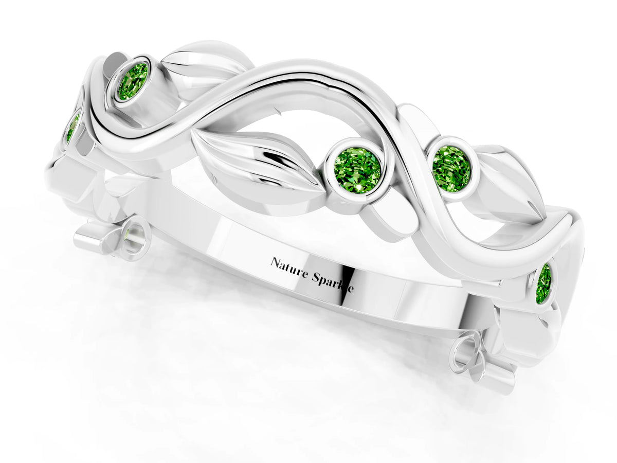 Round Peridot Leaf Motif Eternity Band in Platinum with Bezel Setting