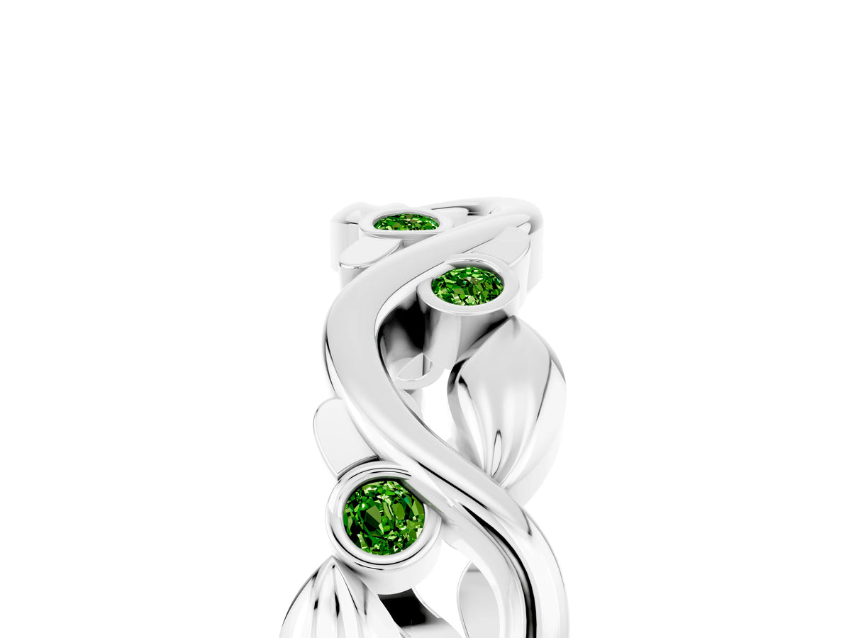 Round Peridot Leaf Motif Eternity Band in Platinum with Bezel Setting