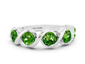 Round Peridot Wave Band in Silver with Channel Setting and Shared Prongs