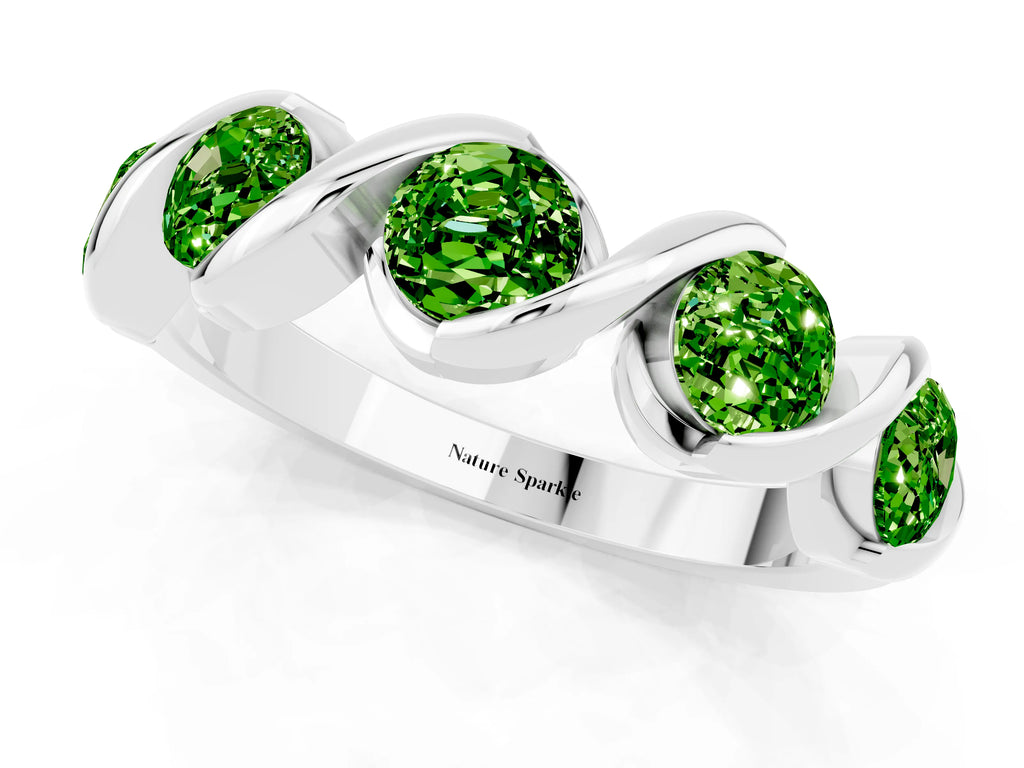 Round Peridot Wave Band in Silver with Channel Setting and Shared Prongs