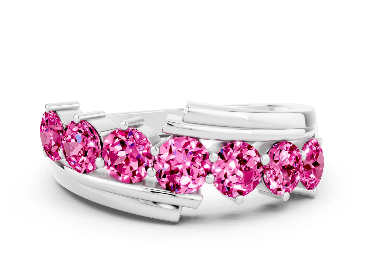 Round Pink Sapphire Wave Band in Silver with Channel and Shared Prong Setting