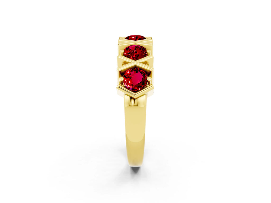 Round Ruby Channel Set Band in Yellow gold with X-Prong Detail