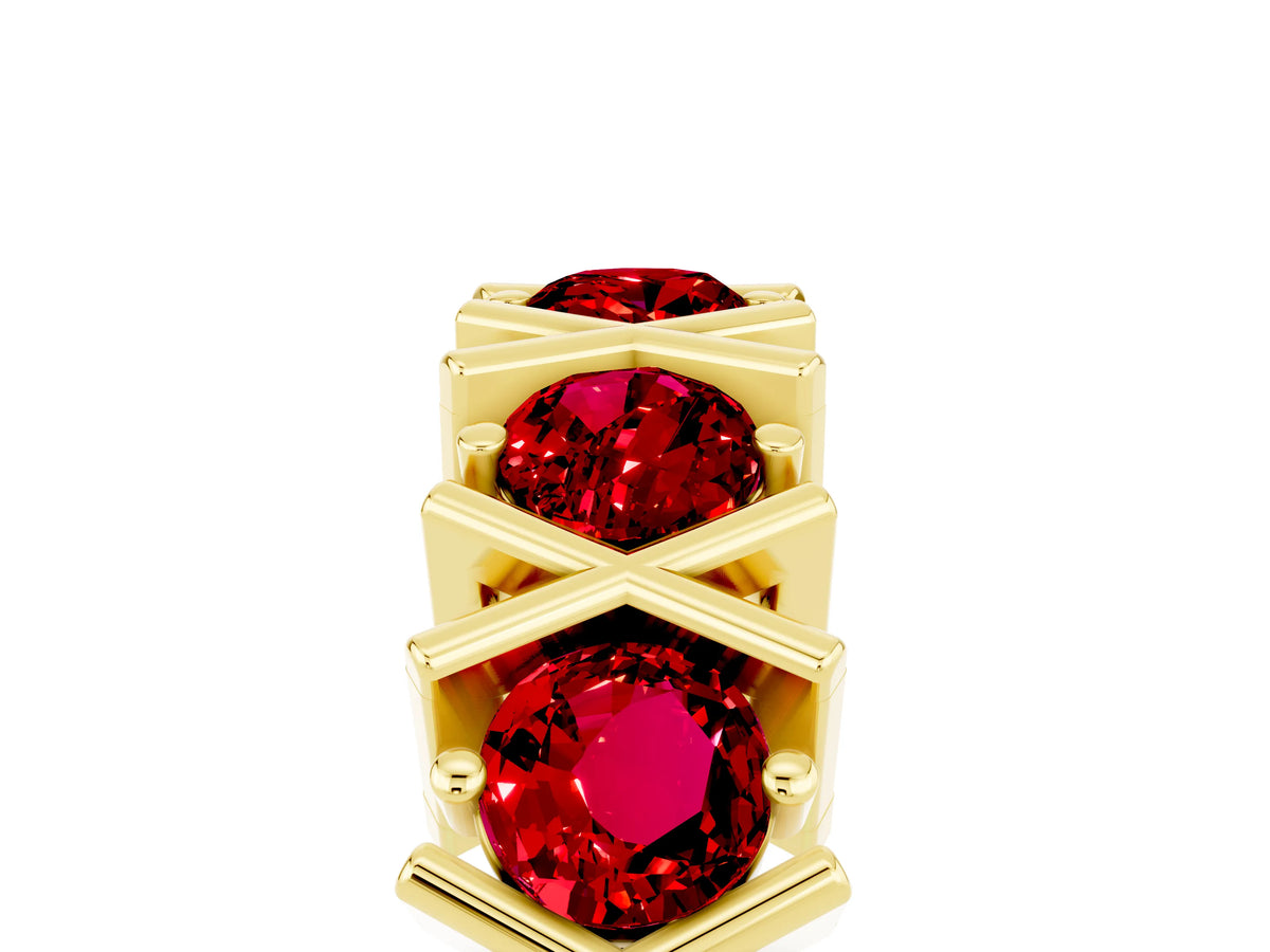 Round Ruby Channel Set Band in Yellow gold with X-Prong Detail