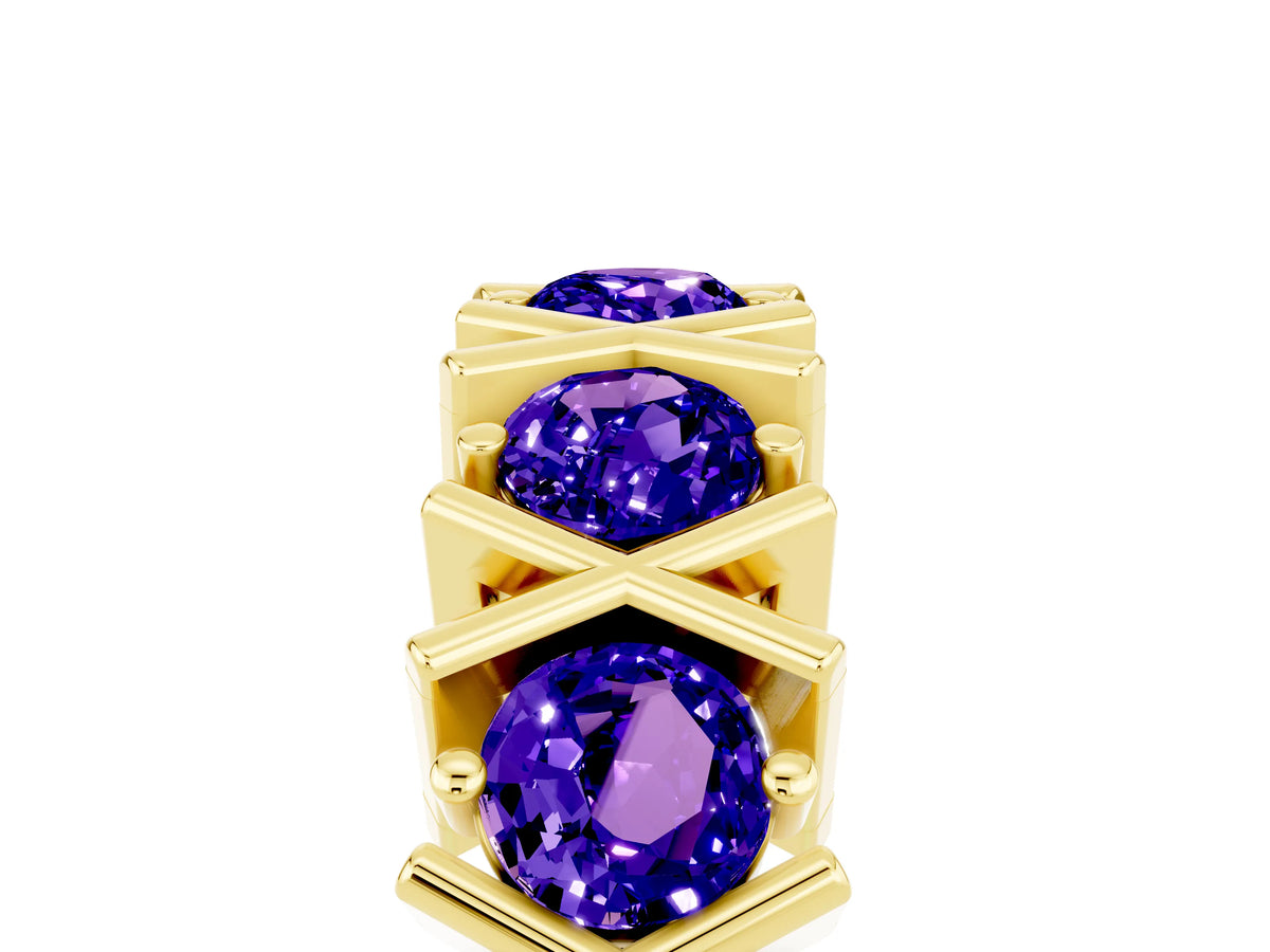 Round Tanzanite Channel Set Band in Yellow gold with X-Prong Detail