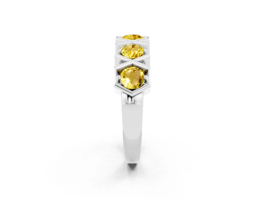 Round Yellow Sapphire Channel Set Band in White gold with X-Prong Detail