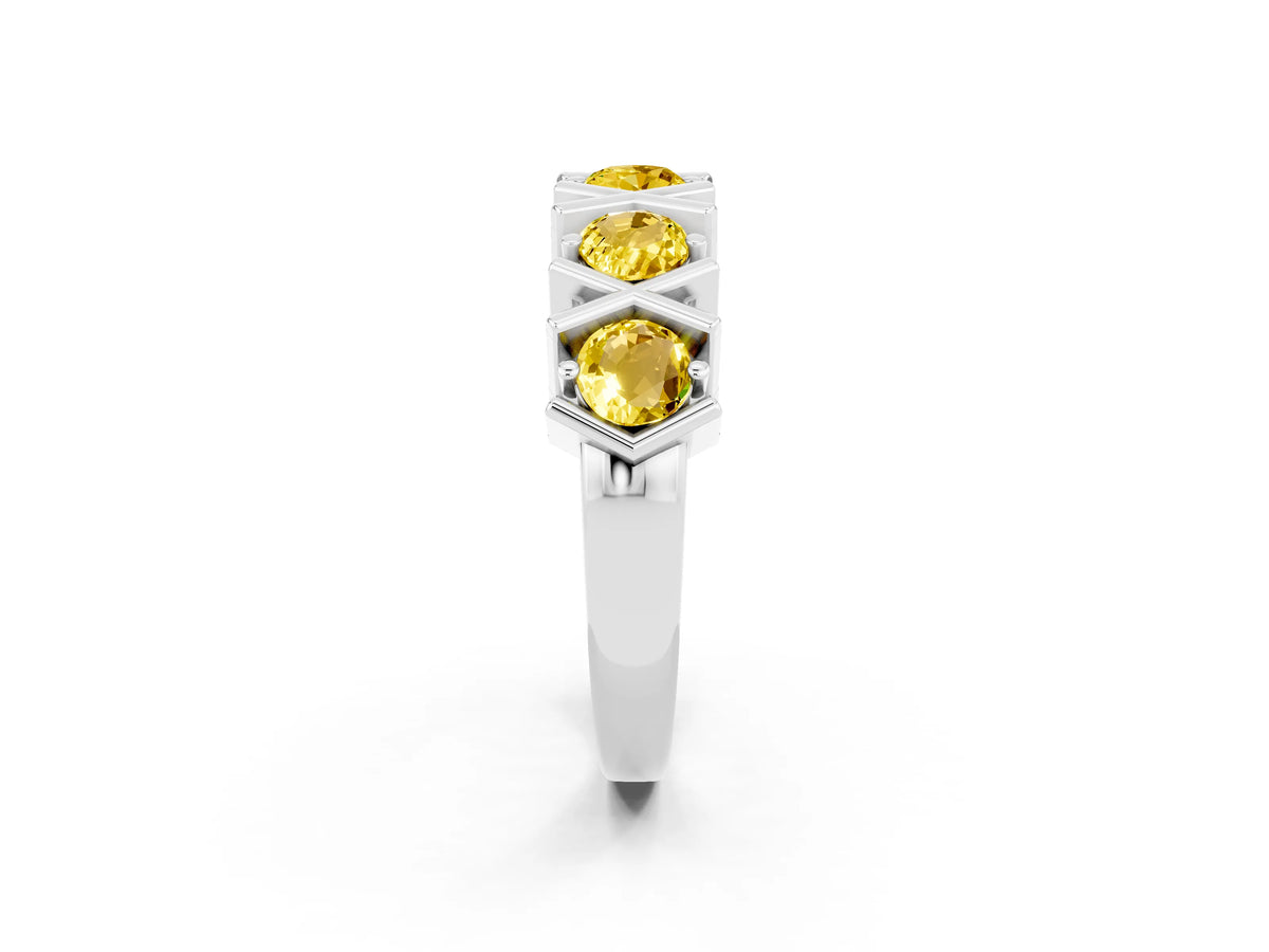Round Yellow Sapphire Channel Set Band in White gold with X-Prong Detail