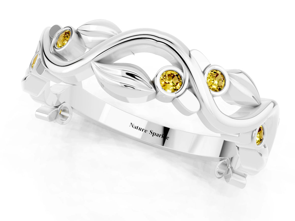 Round Yellow Sapphire Leaf Motif Eternity Band in White gold with Bezel Setting