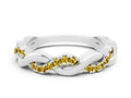Round Yellow Sapphire Pavé Twist Eternity Band in White gold with Shared Prong Setting