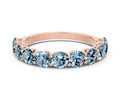 Shared Prong Round Aquamarine Eternity Band in Rose gold with Continuous Circle 