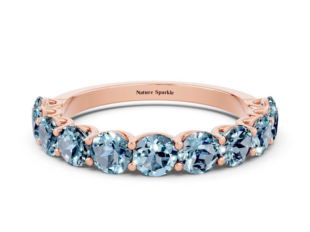 Shared Prong Round Aquamarine Eternity Band in Rose gold with Continuous Circle