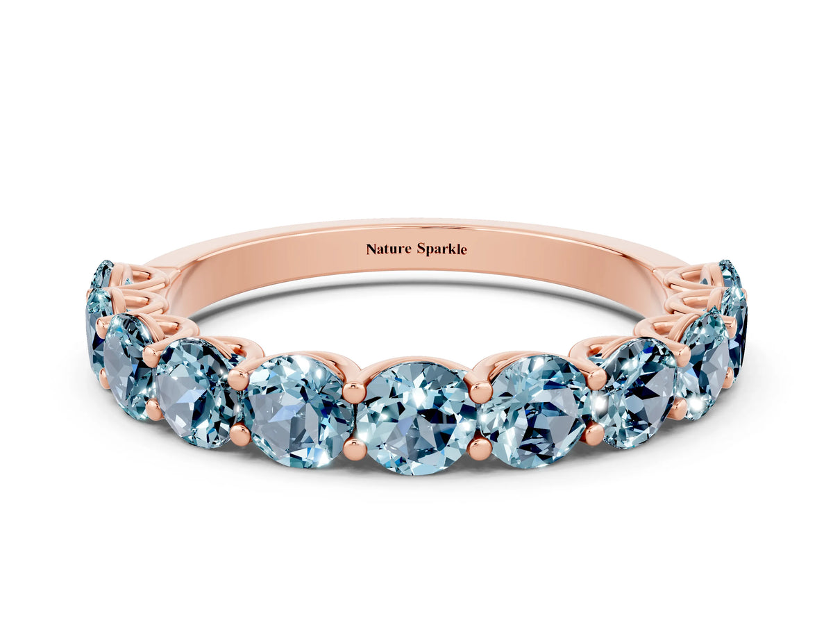 Shared Prong Round Aquamarine Eternity Band in Rose gold with Continuous Circle