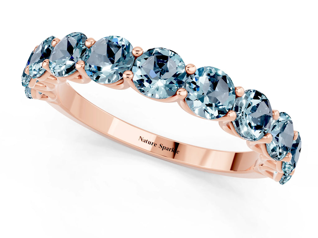 Shared Prong Round Aquamarine Eternity Band in Rose gold with Continuous Circle