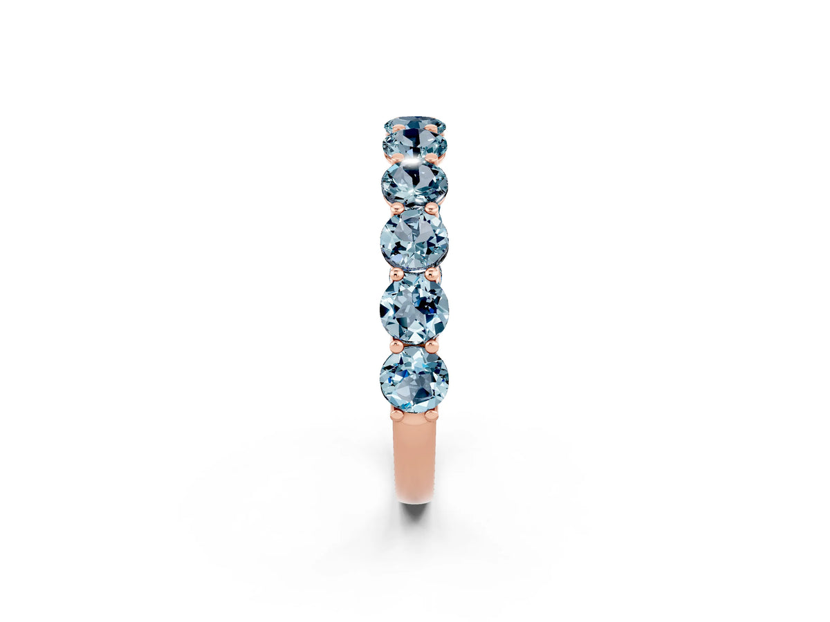 Shared Prong Round Aquamarine Eternity Band in Rose gold with Continuous Circle