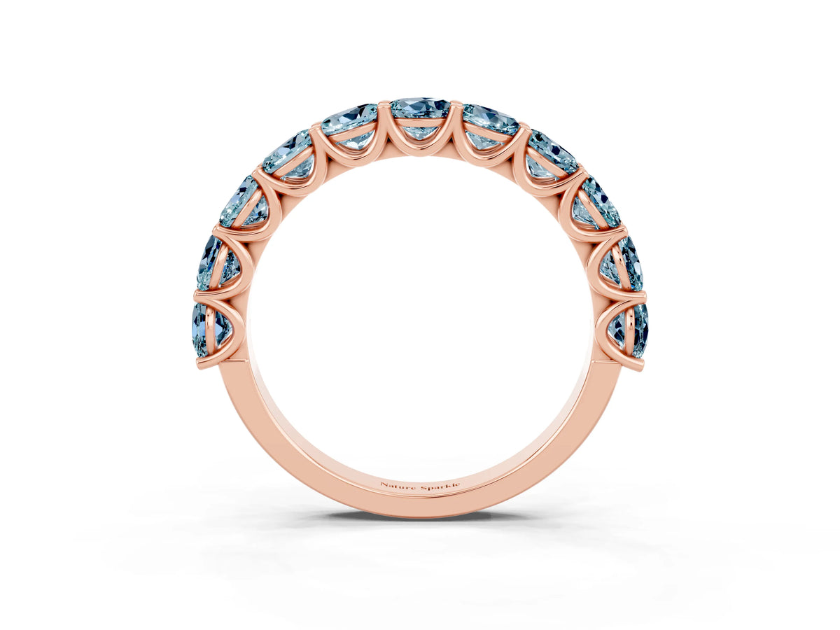 Shared Prong Round Aquamarine Eternity Band in Rose gold with Continuous Circle