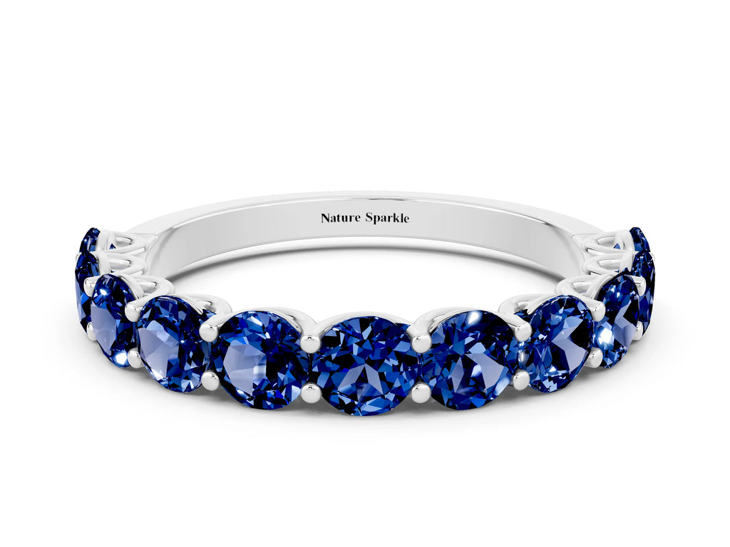 Shared Prong Round Blue Sapphire Eternity Band in White gold with Continuous Circle