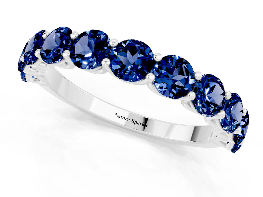 Shared Prong Round Blue Sapphire Eternity Band in White gold with Continuous Circle