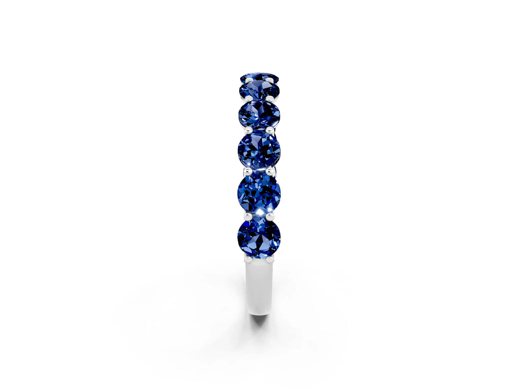 Shared Prong Round Blue Sapphire Eternity Band in White gold with Continuous Circle