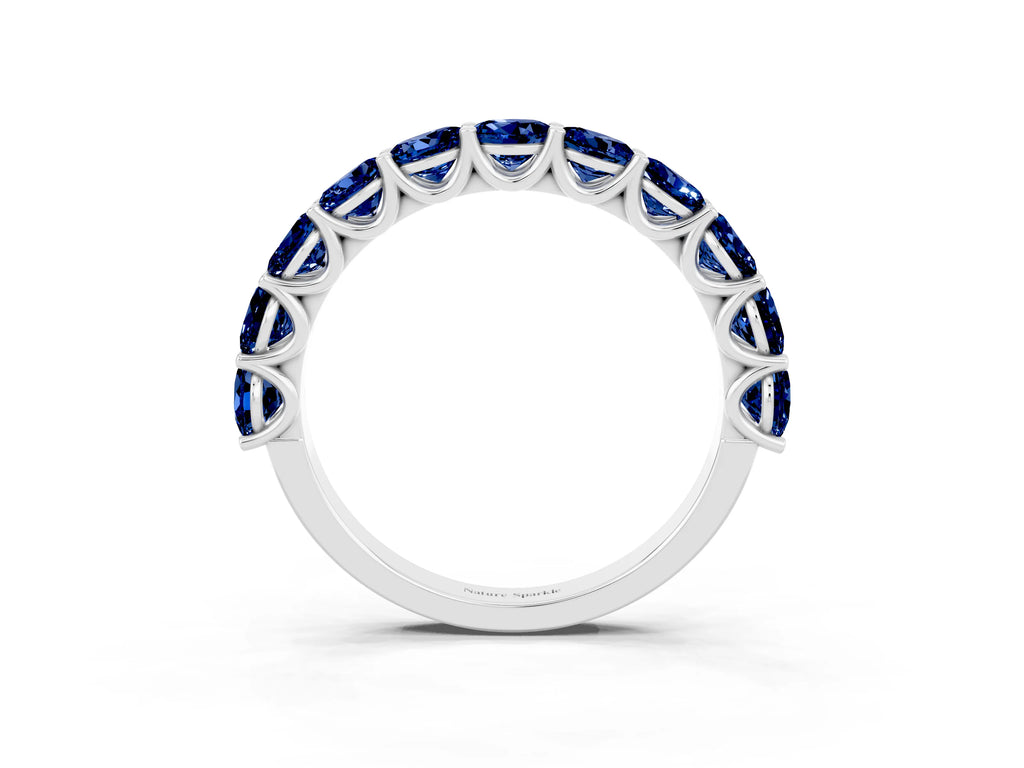 Shared Prong Round Blue Sapphire Eternity Band in White gold with Continuous Circle