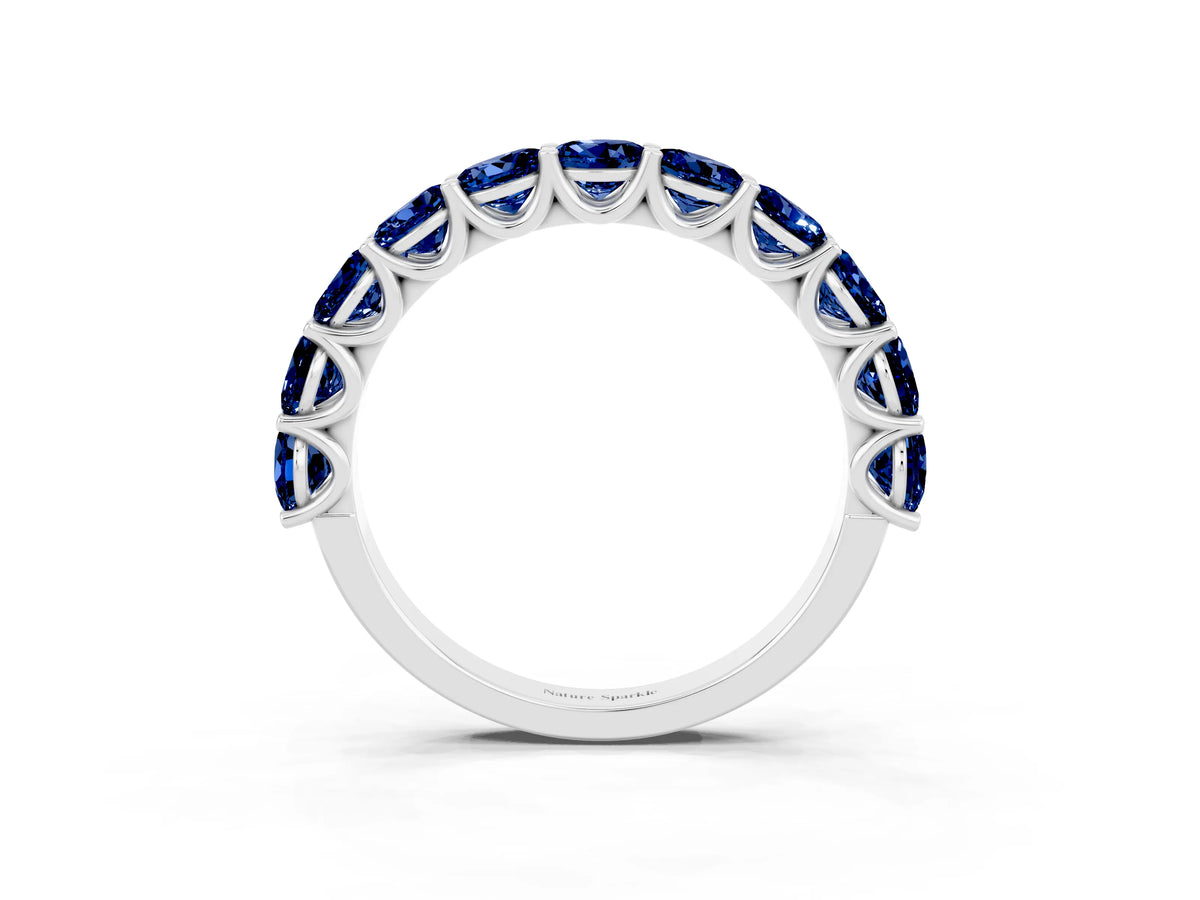 Shared Prong Round Blue Sapphire Eternity Band in White gold with Continuous Circle