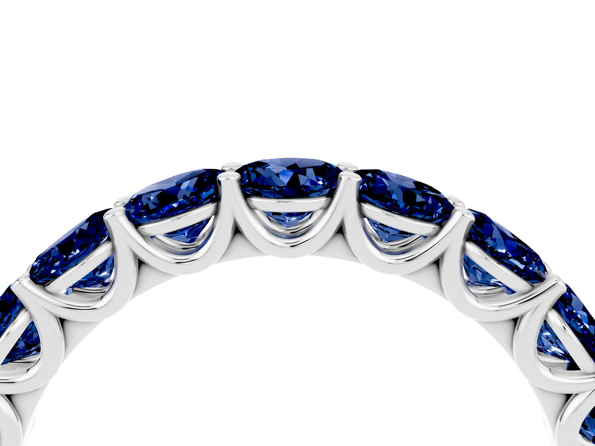 Shared Prong Round Blue Sapphire Eternity Band in White gold with Continuous Circle