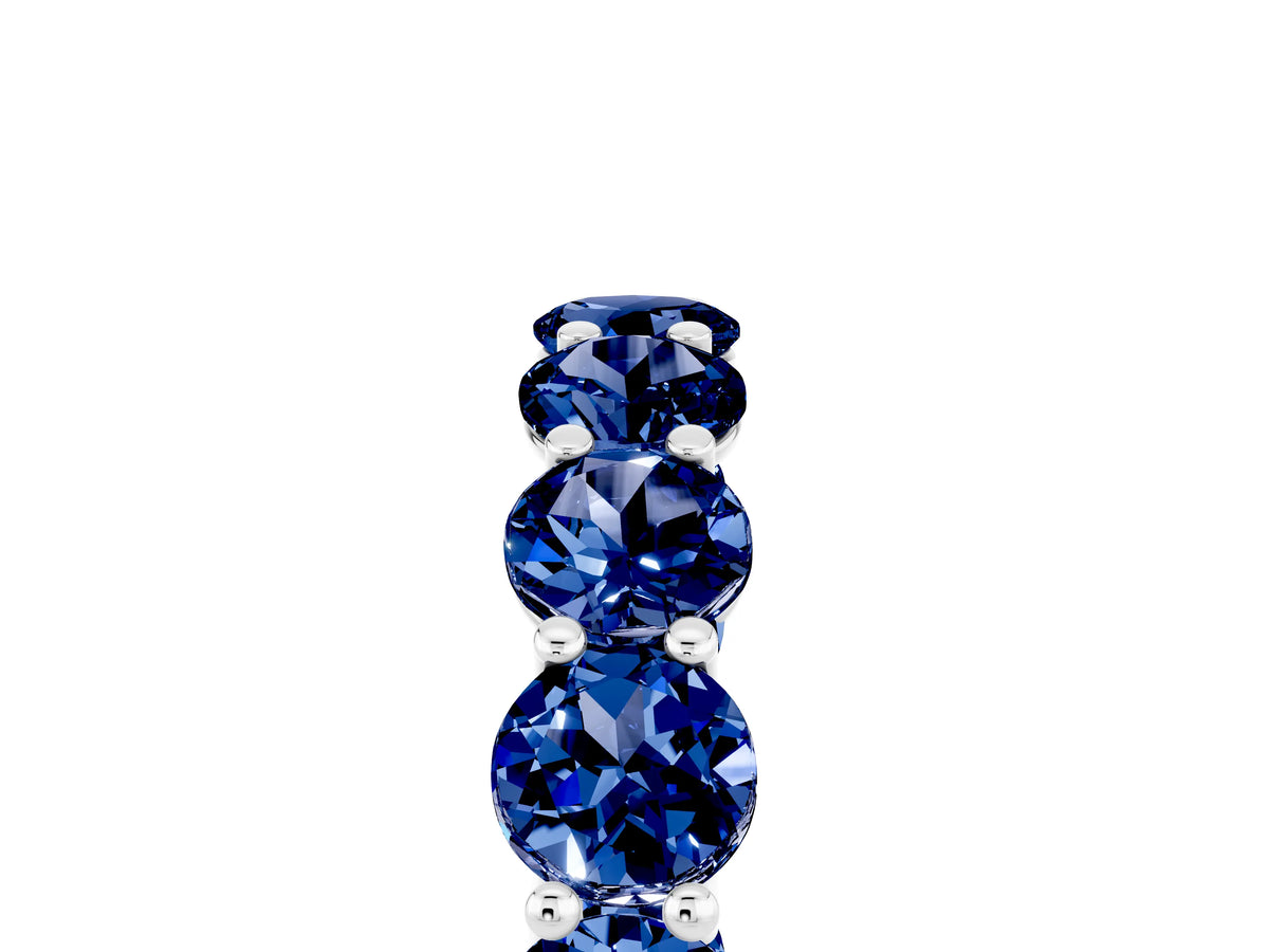 Shared Prong Round Blue Sapphire Eternity Band in White gold with Continuous Circle