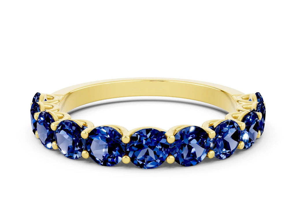 Shared Prong Round Blue Sapphire Eternity Band in Yellow gold with Continuous Circle 