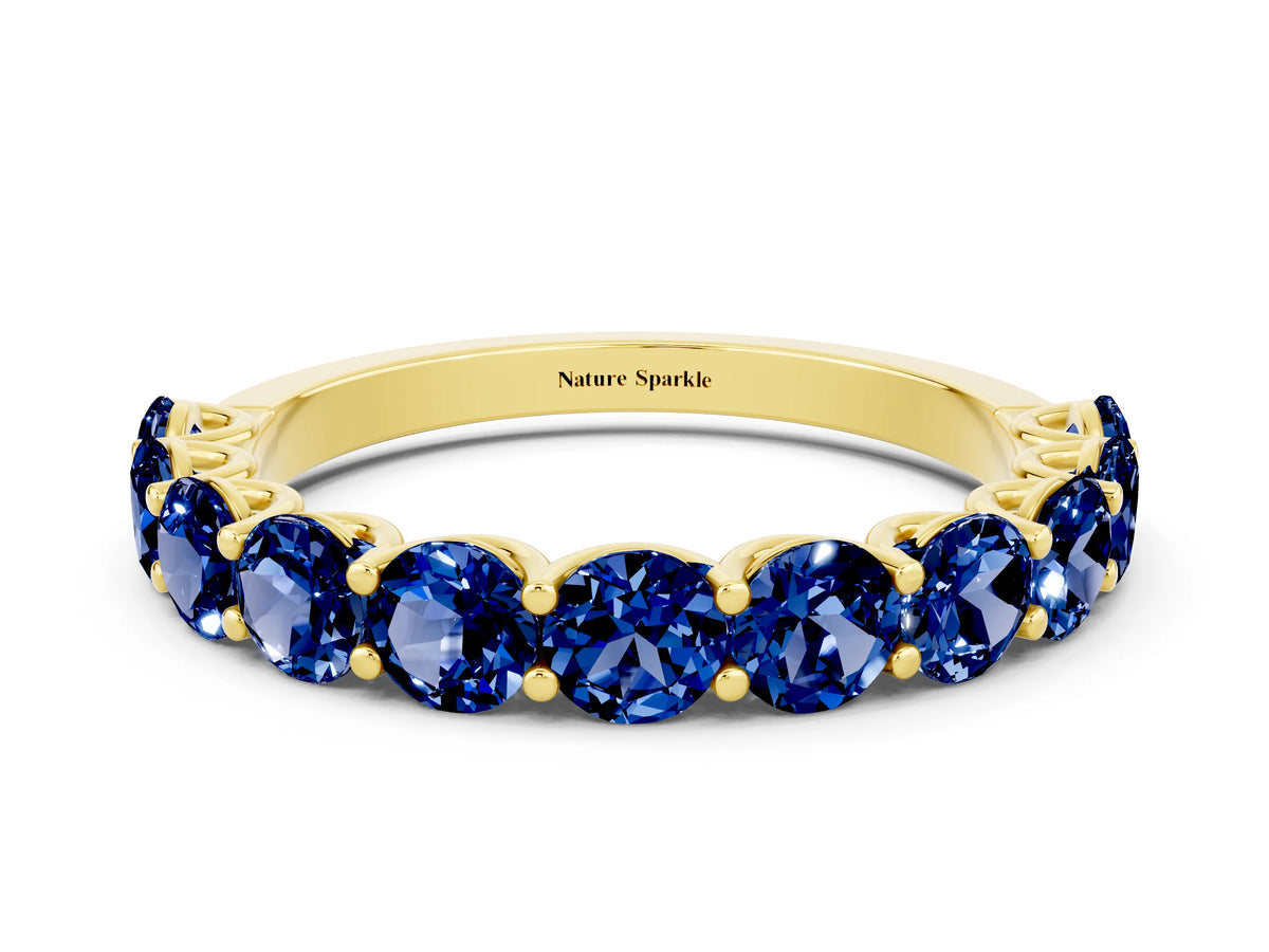 Shared Prong Round Blue Sapphire Eternity Band in Yellow gold with Continuous Circle