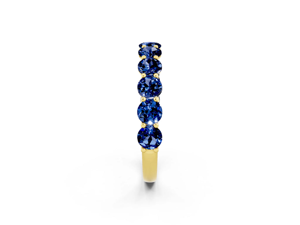 Shared Prong Round Blue Sapphire Eternity Band in Yellow gold with Continuous Circle