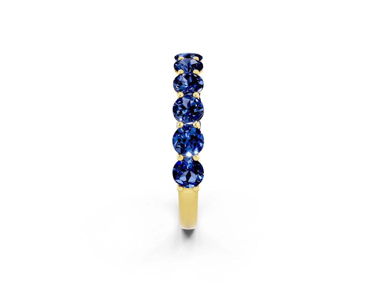 Shared Prong Round Blue Sapphire Eternity Band in Yellow gold with Continuous Circle