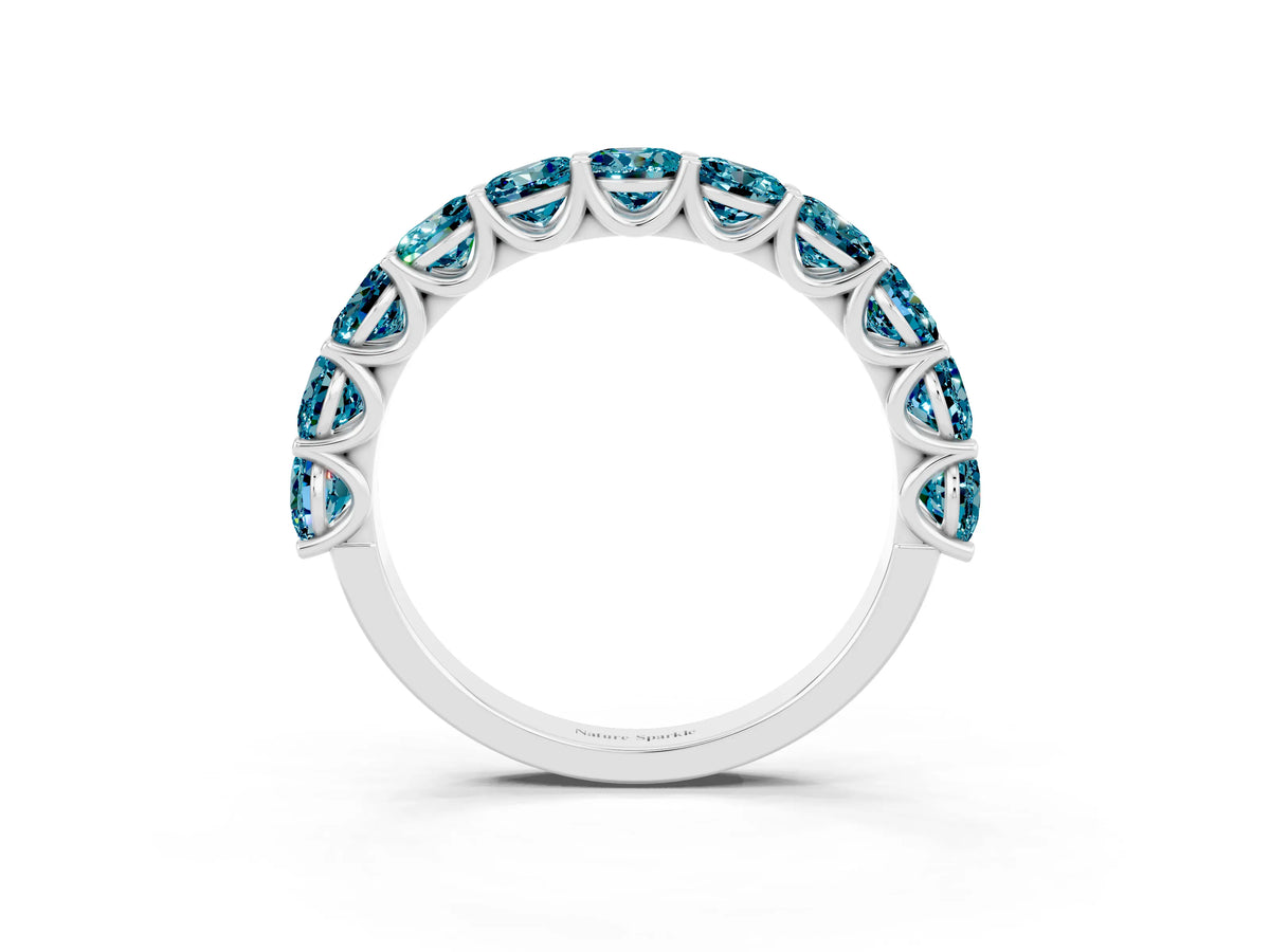 Shared Prong Round Blue Topaz Eternity Band in White gold with Continuous Circle