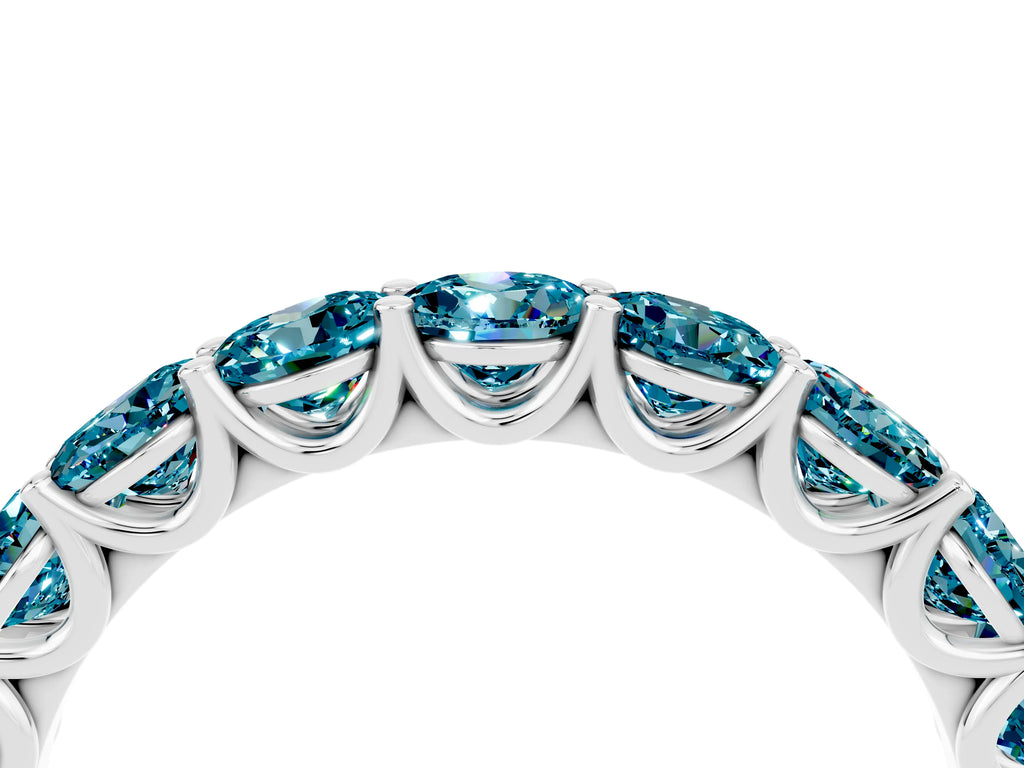 Shared Prong Round Blue Topaz Eternity Band in White gold with Continuous Circle