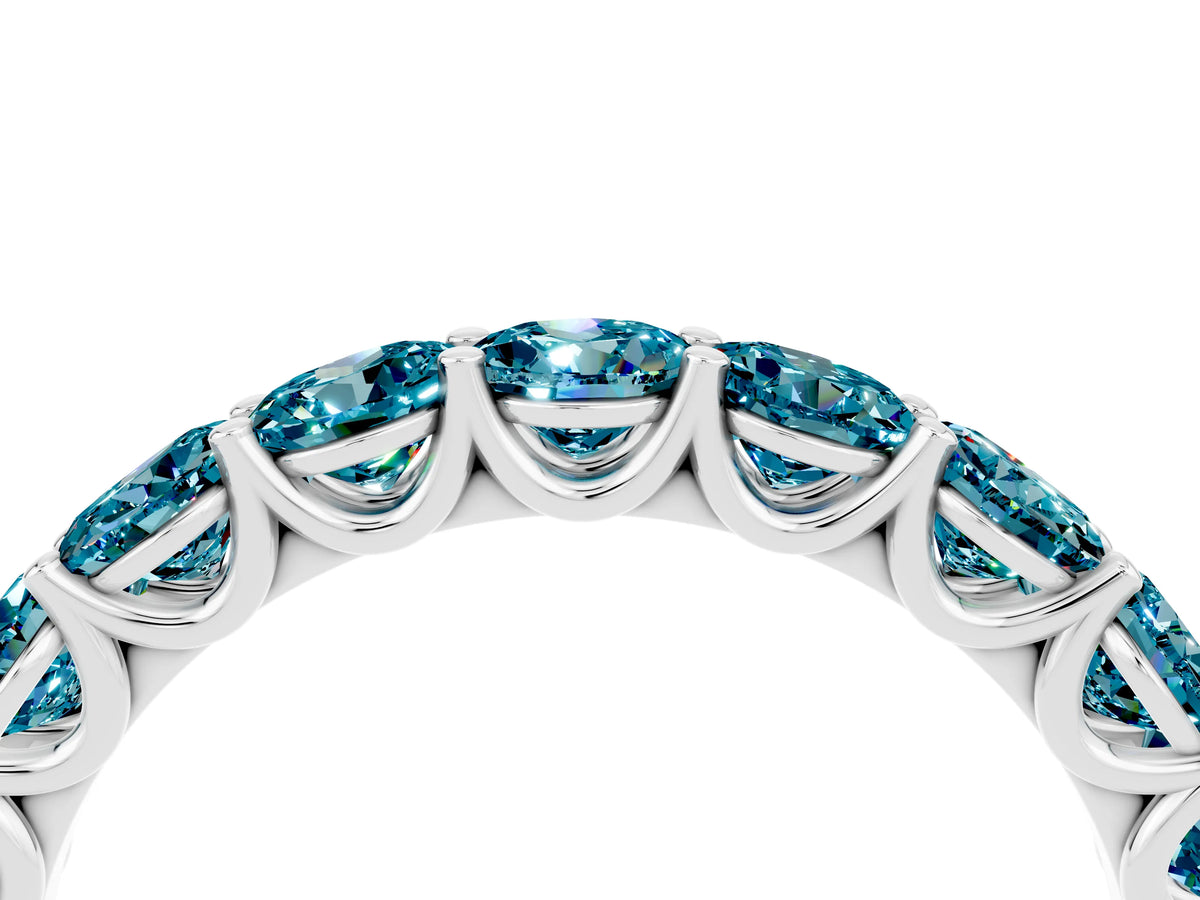 Shared Prong Round Blue Topaz Eternity Band in White gold with Continuous Circle